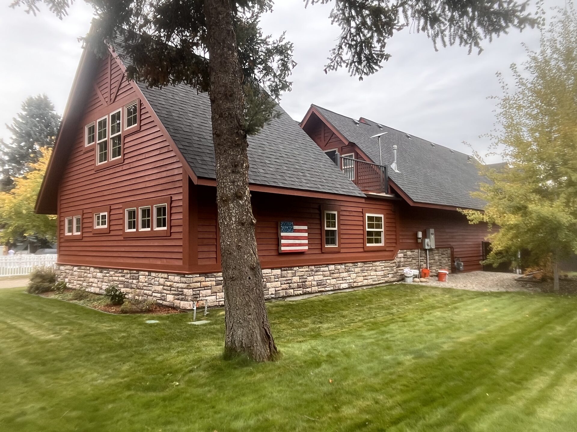 Roofline detail exterior painting North Idaho log home by Donner Painting
