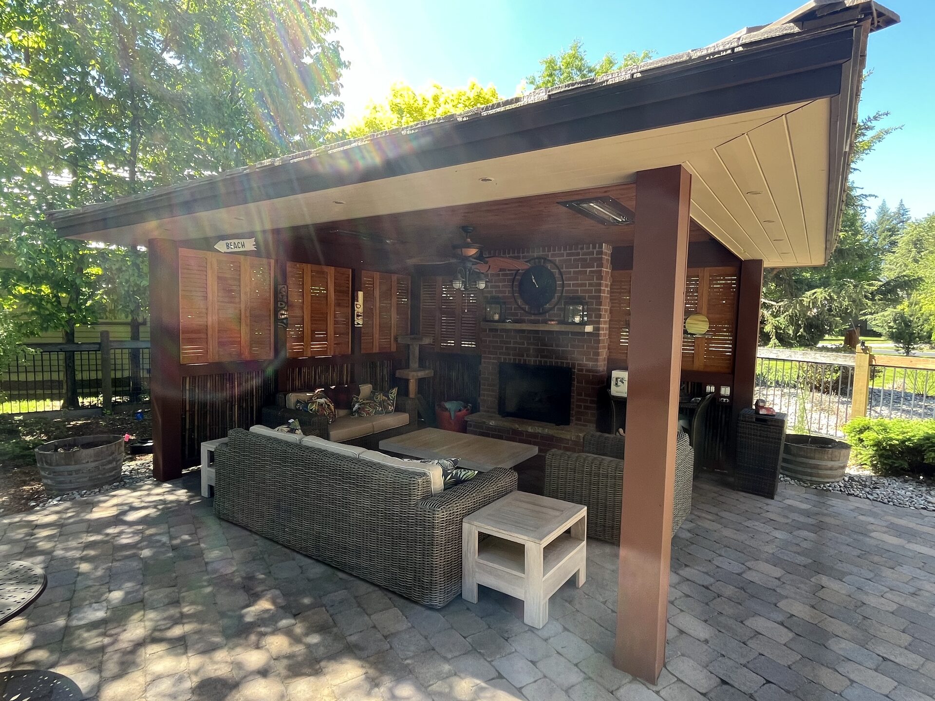 Covered outdoor living area exterior wood staining in North Idaho